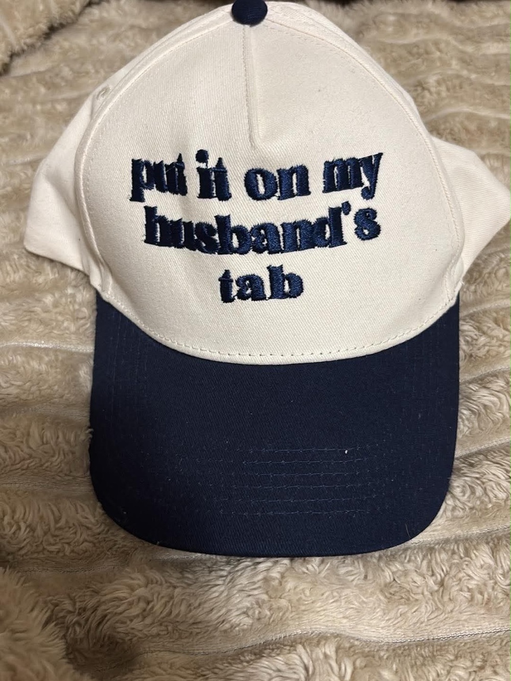 White and Navy Embroidered Baseball Cap - "put it on my husband's tab"